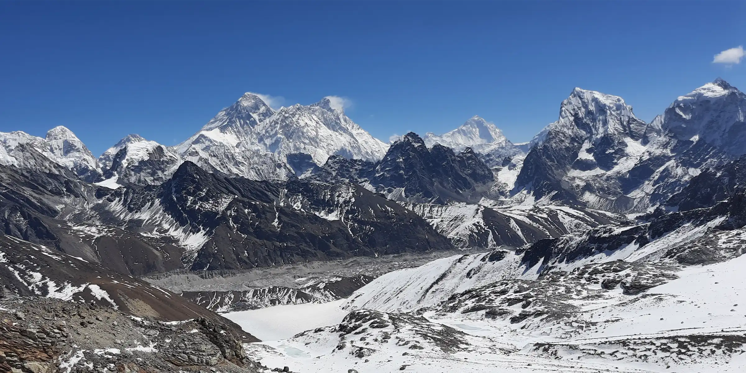Trekker on a high Himalayan pass in Nepal at altitude